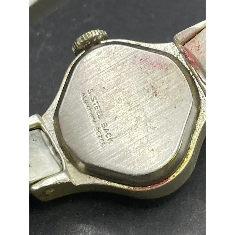 Vintage Timex Watch Women Silver Tone Oval Dial Cuff Band Manual Wind 20mm